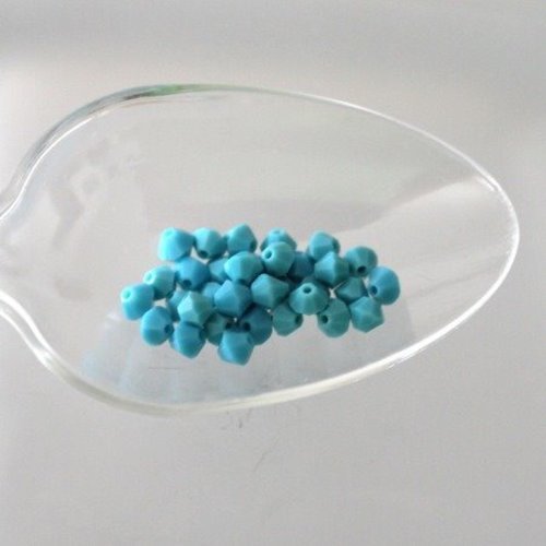 60 perles toupie en cristal t 4 turquoise opaque