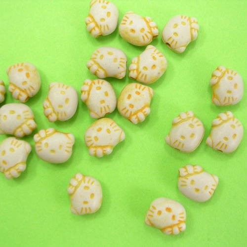 Lot de 20 perles plastiques : chat jaune 9mm (n°1)