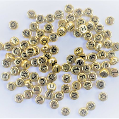 Perles acryliques : 100 rondes dorées lettres noires 7mm