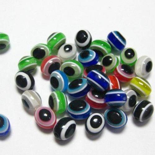 Lot 50 perles acryliques :  ovales yeux multicolores 7.5*6mm