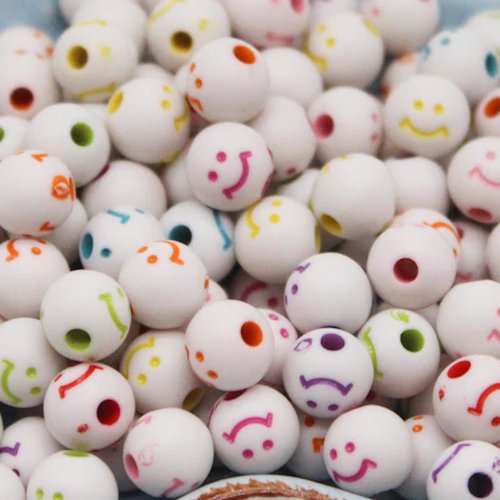 Lot 20 perles acryliques : rondes blanches avec motif visage 8mm