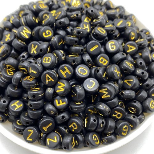 Perles acryliques : rondes noires lettres dorées 7mm