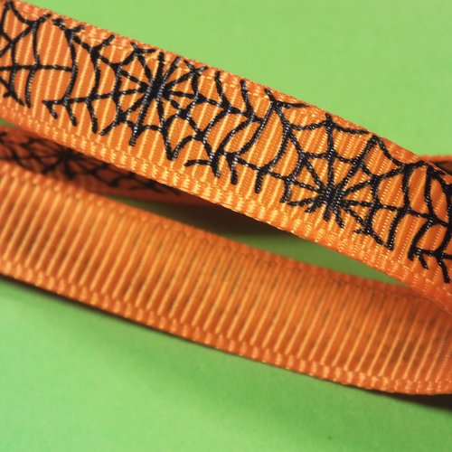 Ruban polyester  : orange motif toile d'araignée largeur 10mm longueur 100cm (01)