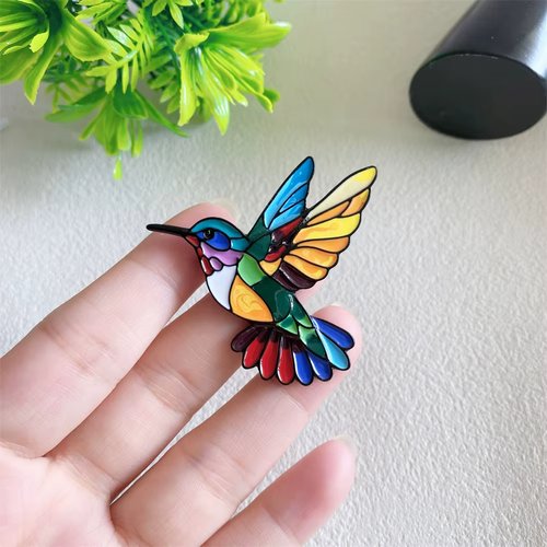 Broche colibri multicolore en métal