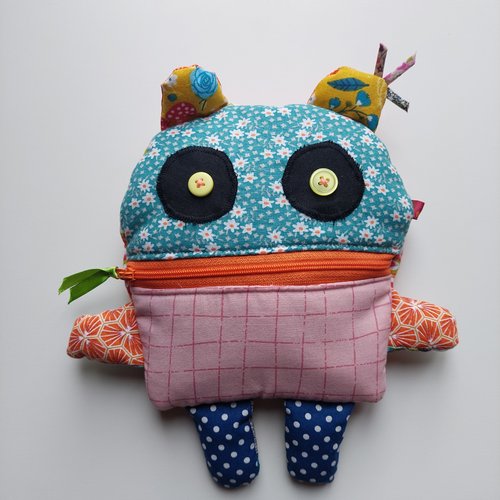 Monstre mange soucis, gai et coloré
