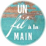 Un fil à la main