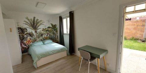 Chambre Jungle avec accès direct au jardin